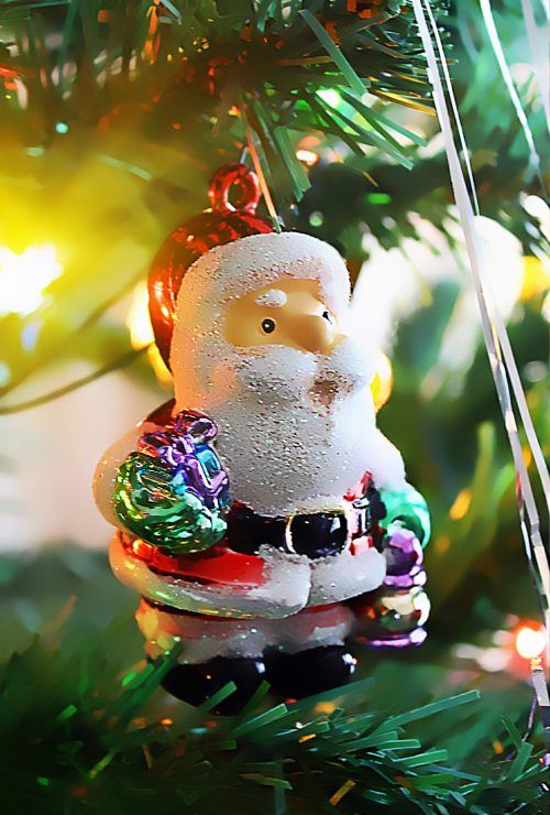toy of santa claus on the christmas tree